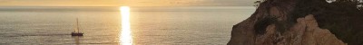 Koganezaki_with_sailboat_in_sunset
